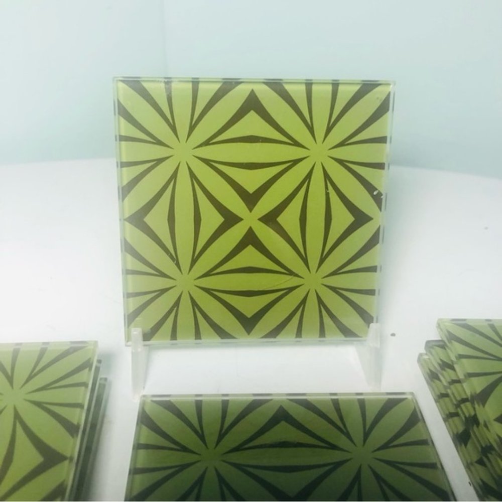 Set of 8 square glass MCM green/black geometric pattern coasters.